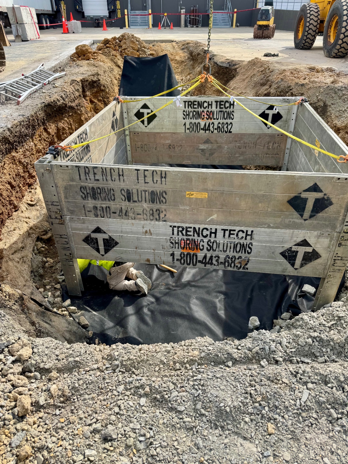 Shored trench box installed during excavation work